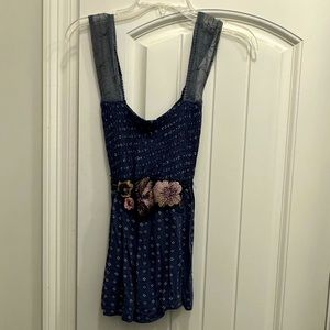 Adorable and feminine free people tank . Size medium